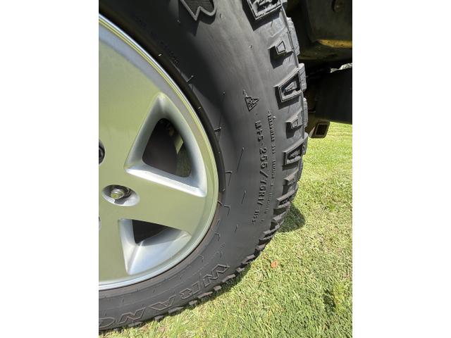 Photo of 2000 Yellow Jeep Wrangler