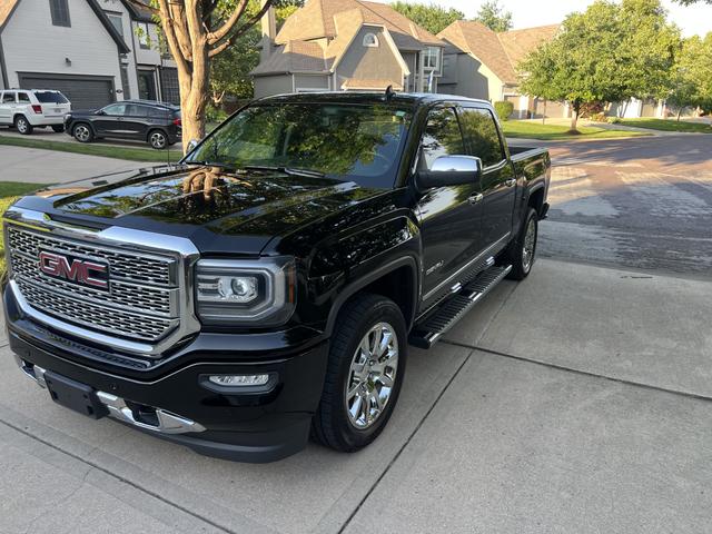Photo of 2016 Black GMC Sierra 1500