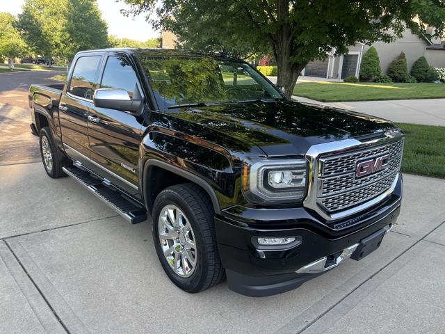 Photo of 2016 Black GMC Sierra 1500