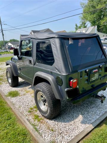 Photo of 2001 Blue Jeep Wrangler