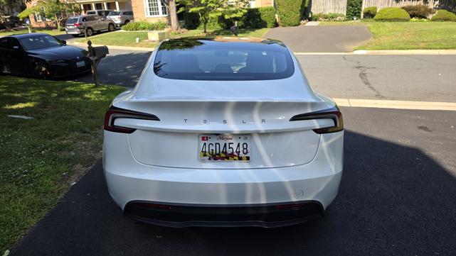 Photo of 2024 White Tesla Model 3