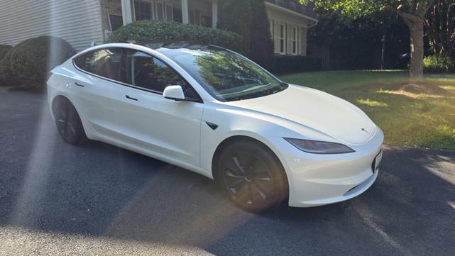 Photo of 2024 White Tesla Model 3