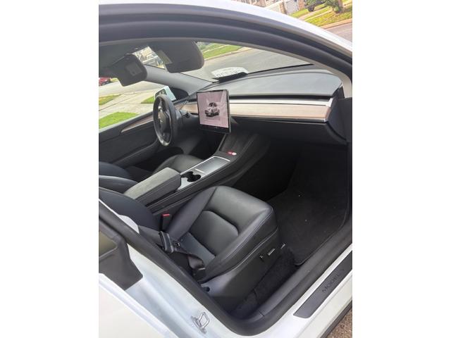 Photo of 2025 White Tesla Model Y