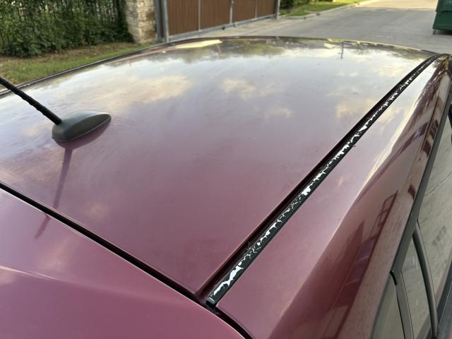 Photo of 2016 Red Nissan Leaf