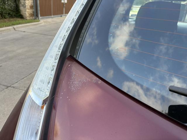 Photo of 2016 Red Nissan Leaf