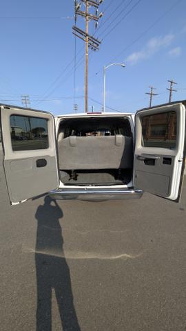 Photo of 2010 White Ford E350 Super Duty