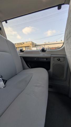 Photo of 2010 White Ford E350 Super Duty