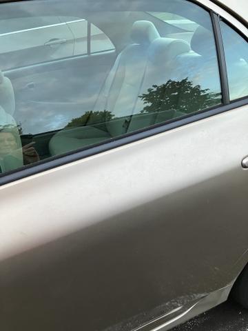 Photo of 2010 Beige Toyota Corolla
