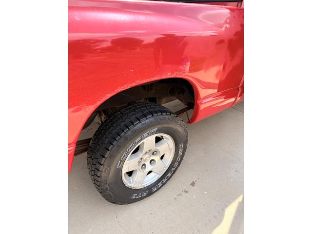 Photo of 2004 Red Dodge Ram 1500