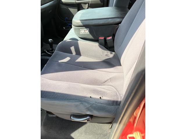 Photo of 2004 Red Dodge Ram 1500