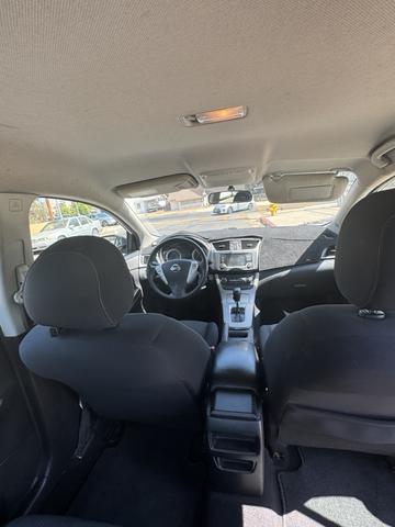 Photo of 2015 White Nissan Sentra
