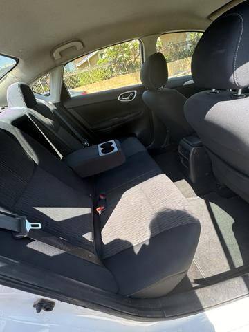 Photo of 2015 White Nissan Sentra