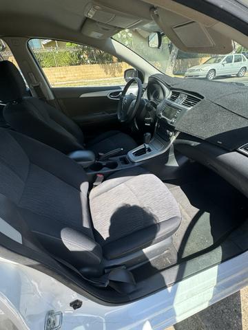 Photo of 2015 White Nissan Sentra