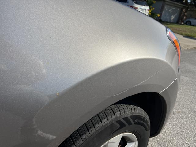 Photo of 2013 Silver Nissan Rogue