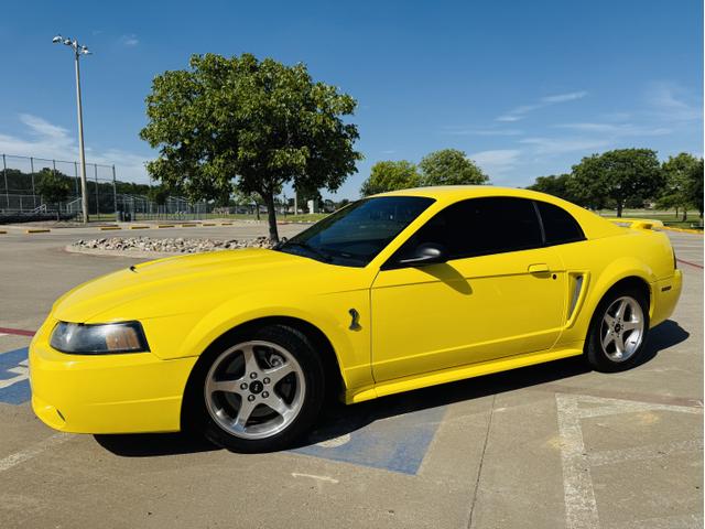 Photo of 2001 Yellow Ford Mustang