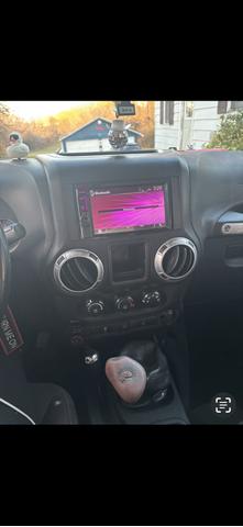 Photo of 2015 Blue Jeep Wrangler