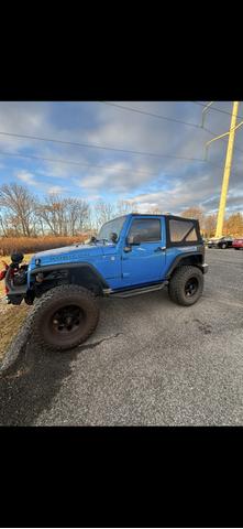 Photo of 2015 Blue Jeep Wrangler