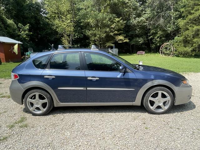 Photo of 2011 Blue Subaru Impreza Outback Sport