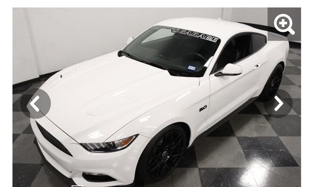 Photo of 2015 White Ford Mustang