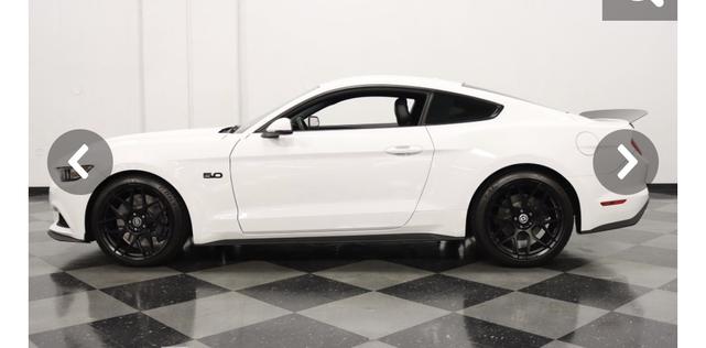 Photo of 2015 White Ford Mustang