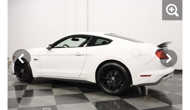 Photo of 2015 White Ford Mustang