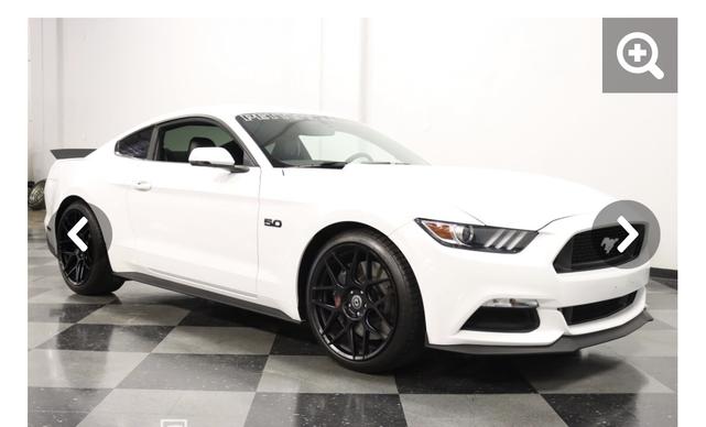Photo of 2015 White Ford Mustang