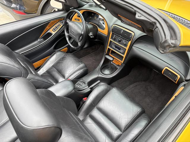Photo of 1995 Yellow Ford Mustang