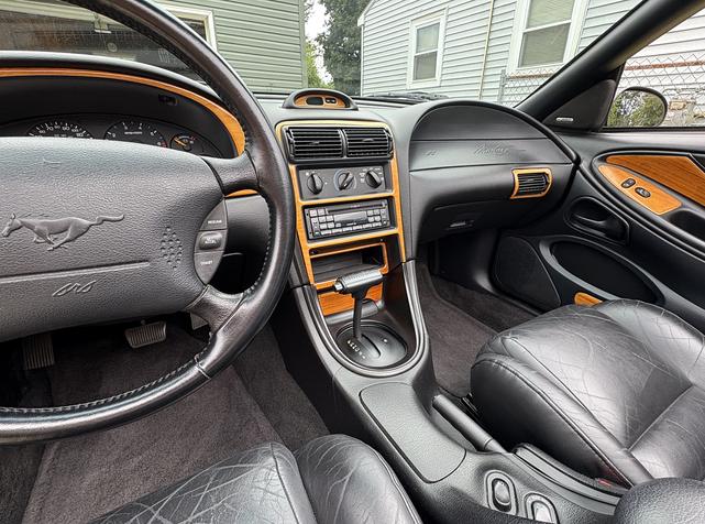 Photo of 1995 Yellow Ford Mustang
