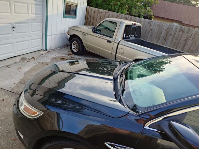 Photo of 2011 Black Ford Taurus