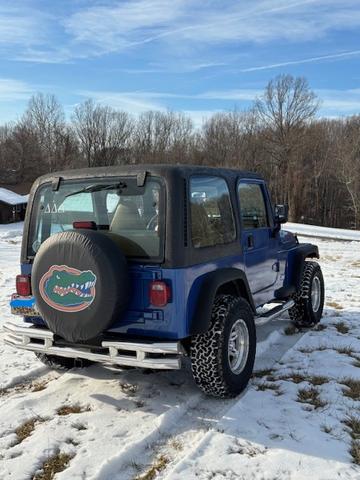 Photo of 1997 Blue Jeep Wrangler