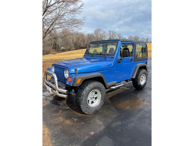Photo of 1997 Blue Jeep Wrangler