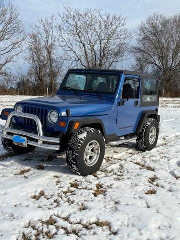 Photo of 1997 Blue Jeep Wrangler
