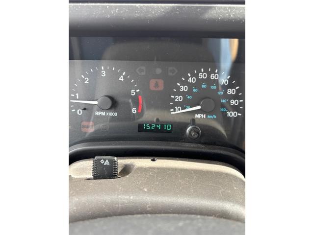 Photo of 1997 Blue Jeep Wrangler