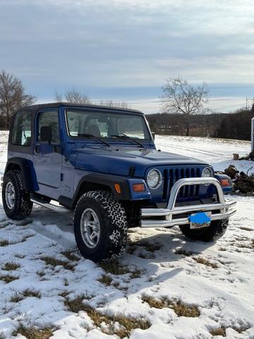 Photo of 1997 Blue Jeep Wrangler