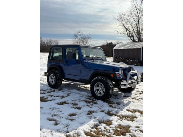 Photo of 1997 Blue Jeep Wrangler