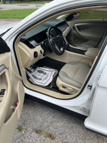 Photo of 2015 White Ford Taurus