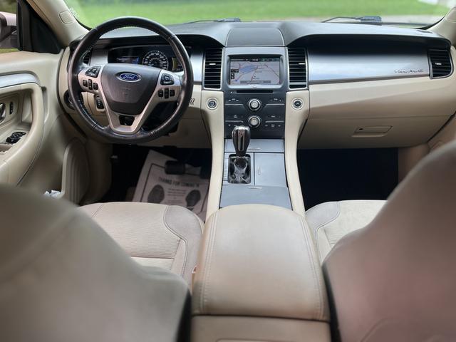 Photo of 2015 White Ford Taurus