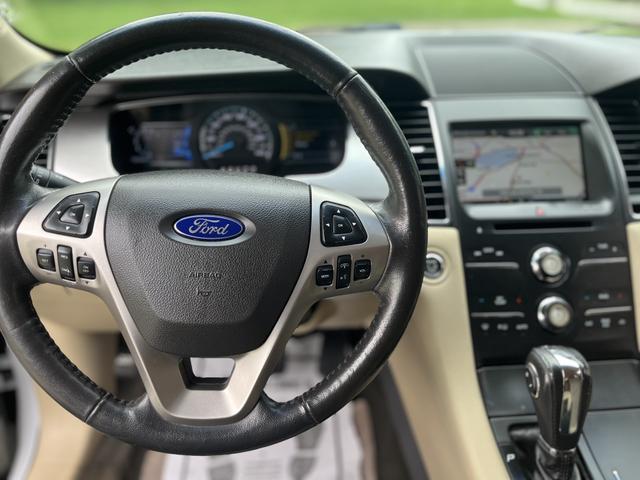 Photo of 2015 White Ford Taurus
