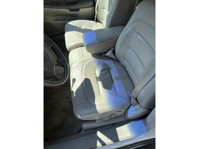 Photo of 2003 White Cadillac DeVille