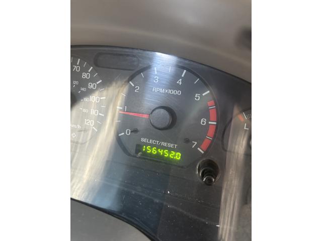 Photo of 2004 Blue Ford Mustang