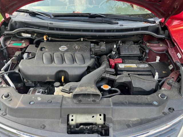 Photo of 2007 Red Nissan Versa