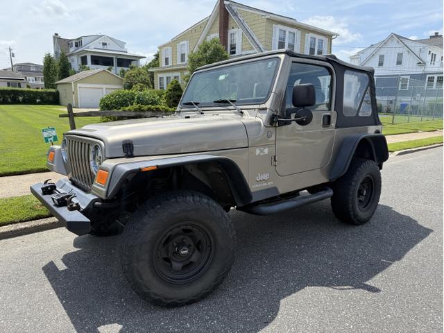 Photo of 2004 Beige Jeep Wrangler