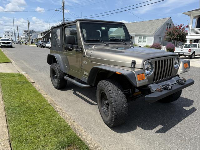Photo of 2004 Beige Jeep Wrangler