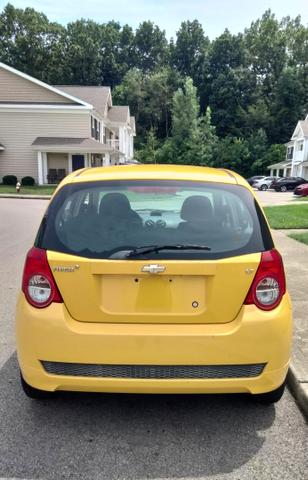 Photo of 2011 Yellow Chevrolet Aveo