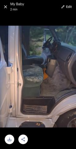 Photo of 2000 Silver Dodge Ram Van