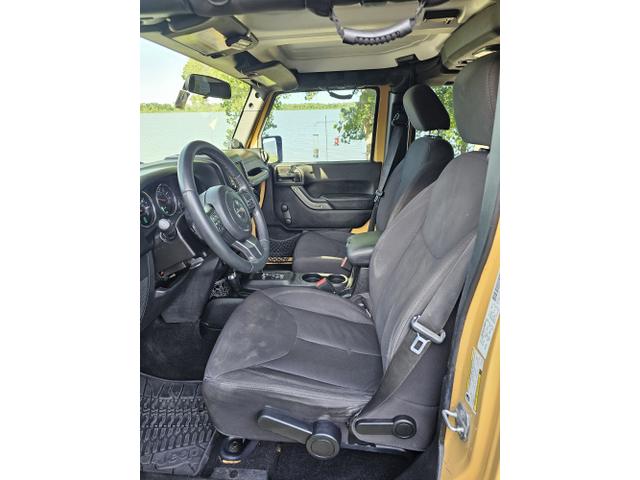Photo of 2014 Yellow Jeep Wrangler Unlimited