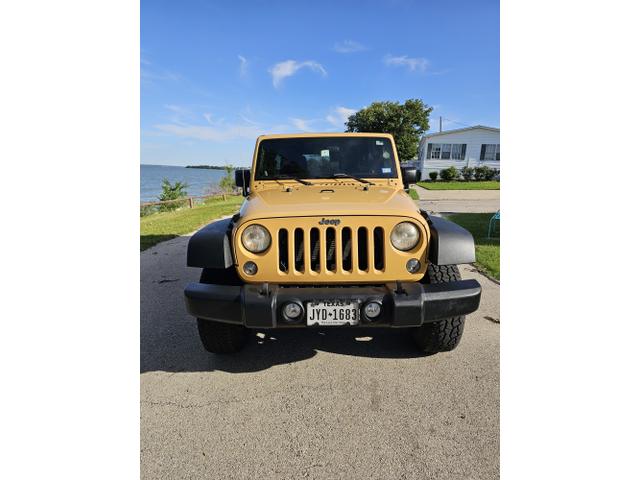Photo of 2014 Yellow Jeep Wrangler Unlimited