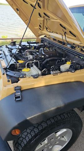 Photo of 2014 Yellow Jeep Wrangler Unlimited