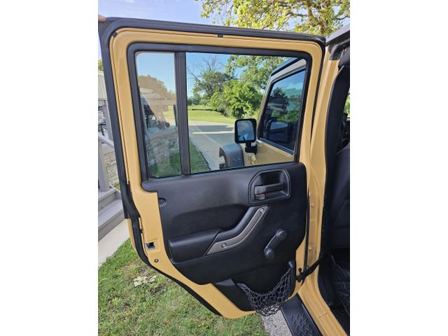 Photo of 2014 Yellow Jeep Wrangler Unlimited