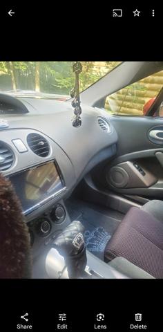 Photo of 2012 Orange Mitsubishi Eclipse